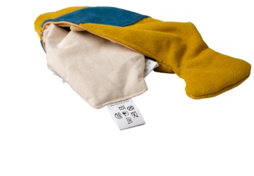 Auf dem Foto sieht man das Gewichtskissen Wanda (Fisch) mit geöffnetem Zipp und dem hervorstehenden Gewichtsbeutel als Anschauungsmuster